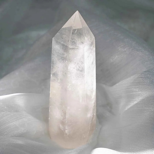 Clear quartz crystal obelisk with a polished point